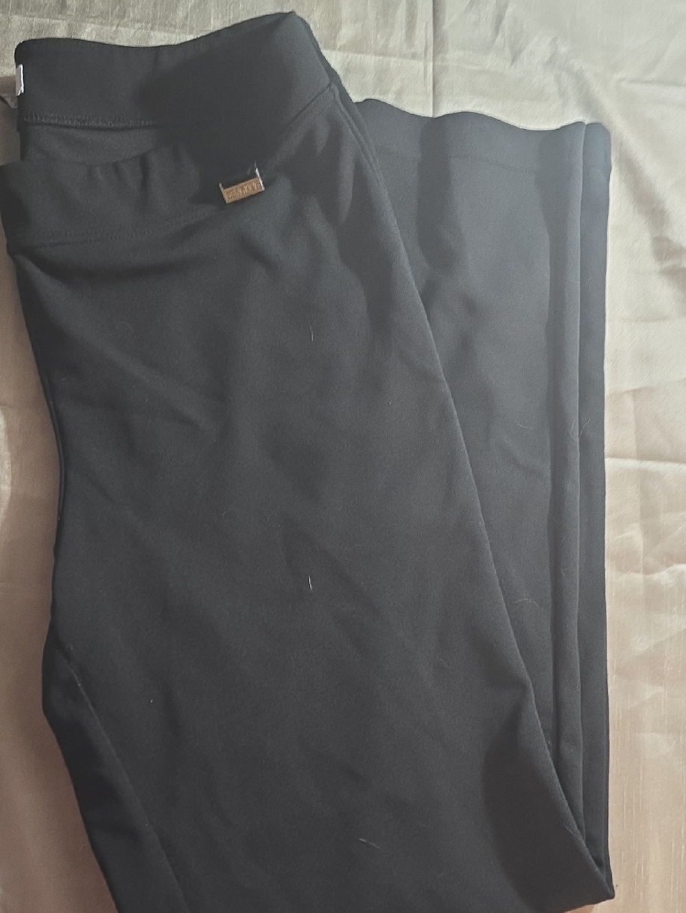 Calvin Klein Black Stretch Pants with Gold Logo Plaque